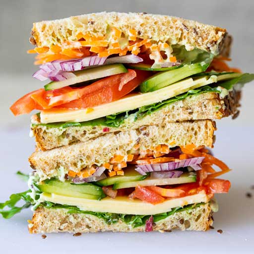 A healthy mixed vegetable sandwich with cheese.